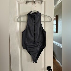 Fabletics bodysuit. And like new condition not sure of size pit to pit 0806‎
